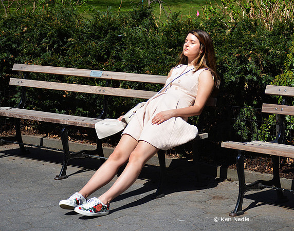 Sun bather in Madison Square park