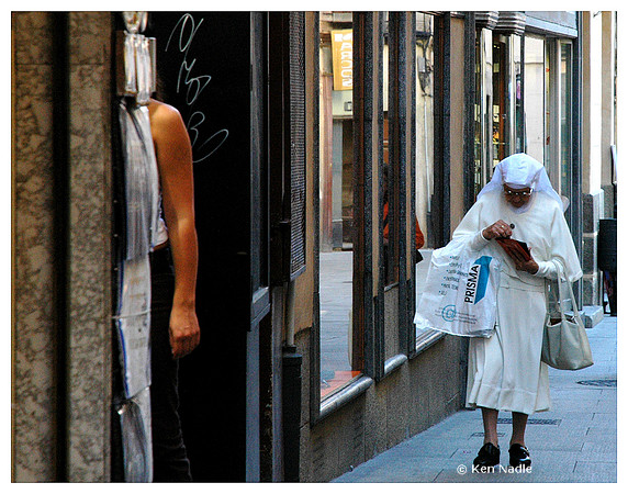 Bare arm and nun