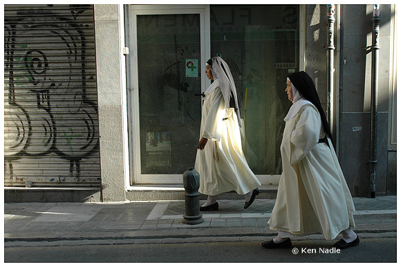 Two nuns walking in Granada