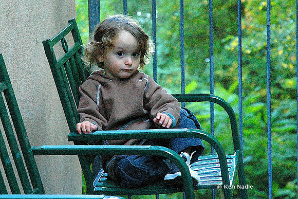 Rojo in green chair