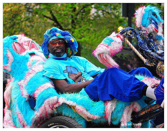 Man on fur lined tricycle