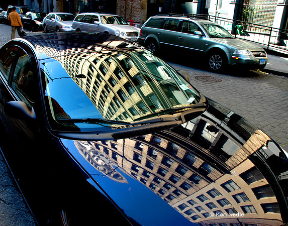Bldg reflection in car