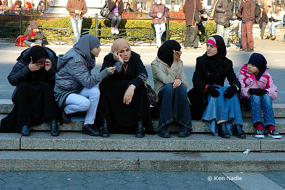 Women and girls on steps